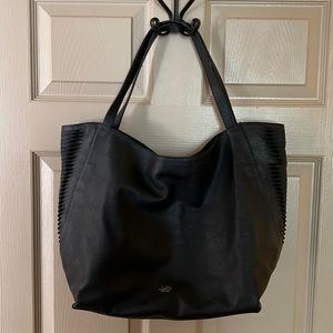 Vince Camuto black leather tote in perfect condition. Used only a couple times.